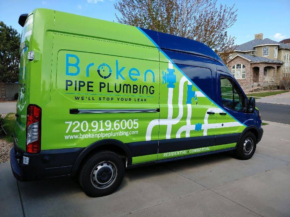 The Broken Pipe Plumbing van parked in a residential driveway